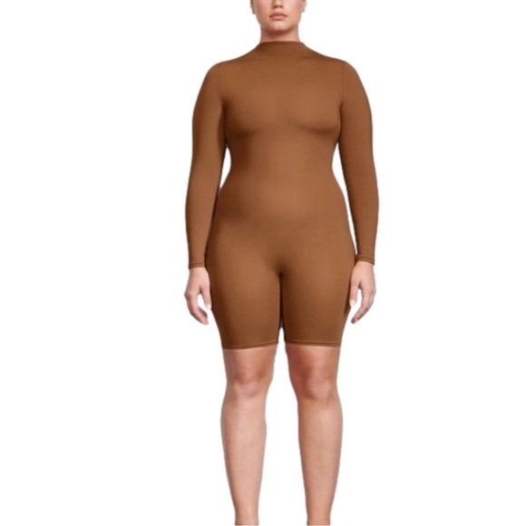 SKIMS Tops - Skims 4X All-In-One Long Sleeve Mid Thigh
Onesie Bodysuit Caramel Brown NWT